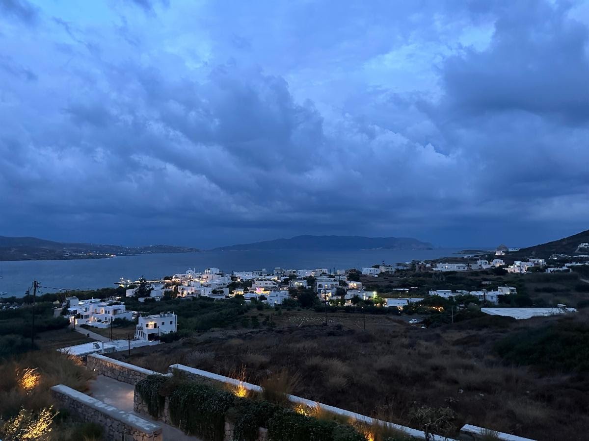 Evening view over Pollonia village on Milos, Greece, from the Milos Breeze resort